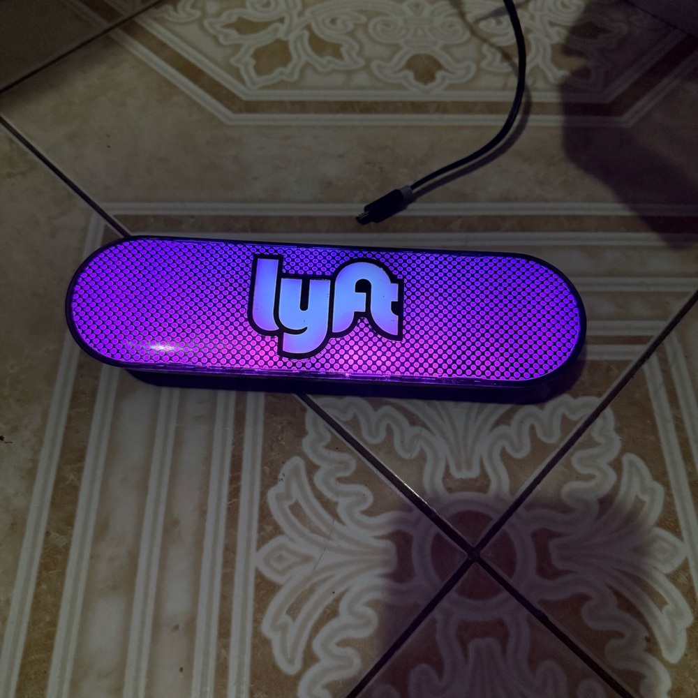 Lyft advertisement car dash light